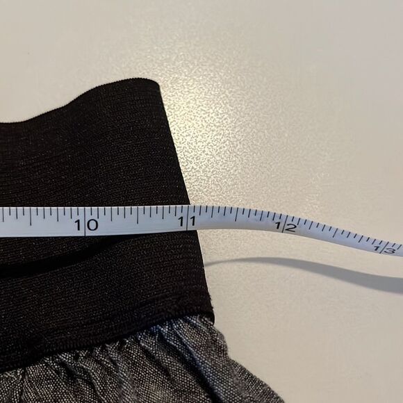 Love Culture wide elastic waistband miniskirt w/ 2 front pockets & faux buttons. - Picture 7 of 8